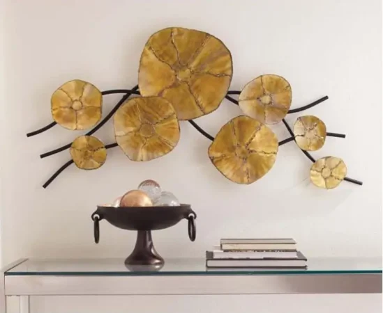 Yellow wall art with decorative bowl on table